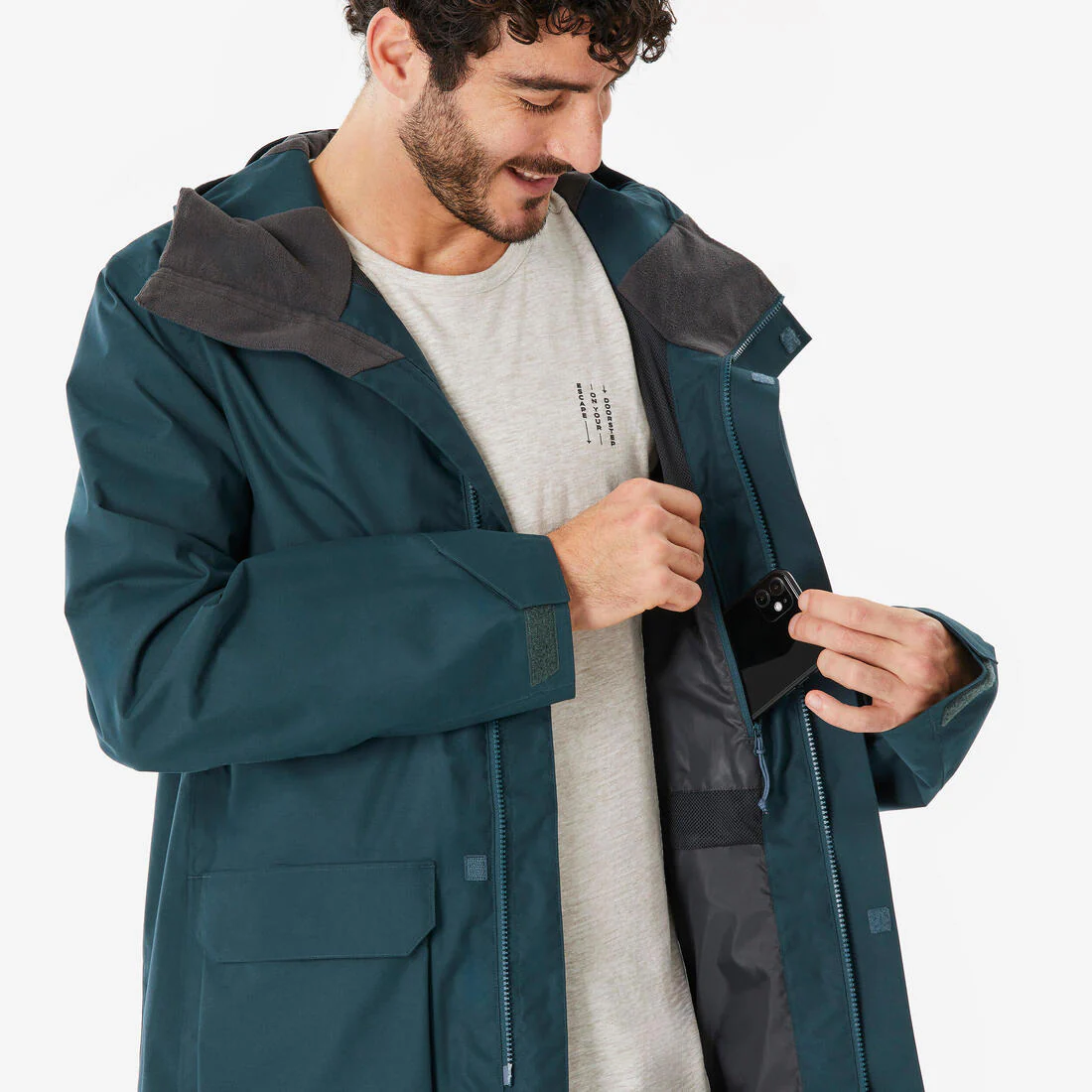 Chamarra de senderismo impermeable y larga verde para hombre NH500 - Image 6