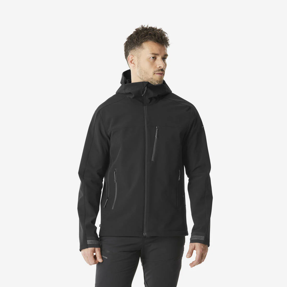 Chamarra de trekking rompevientos negra para hombre Softshell MT500