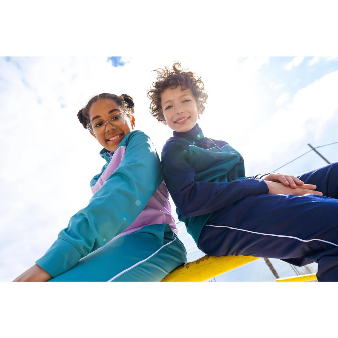 Conjunto deportivo transpirable azul con rosa para niños - Image 9