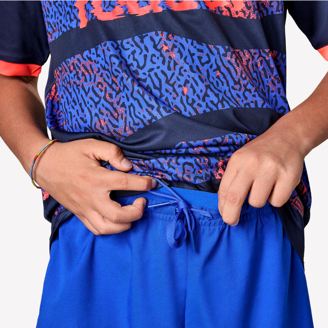Short de futbol azul con banda roja para niño Viralto - Image 13