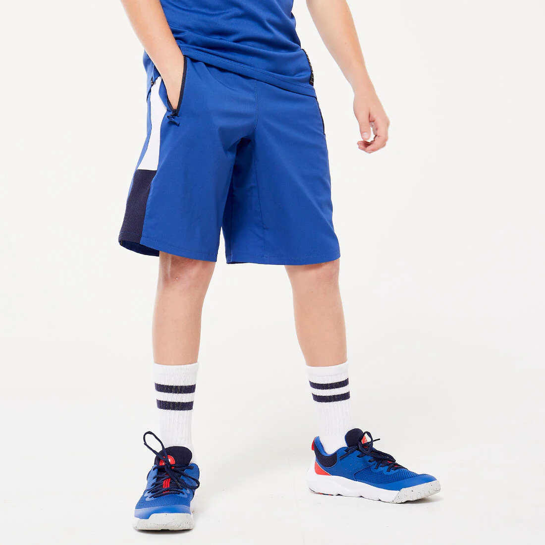 Short para múltiples deportes transpirable azul, blanco y negro para niños
