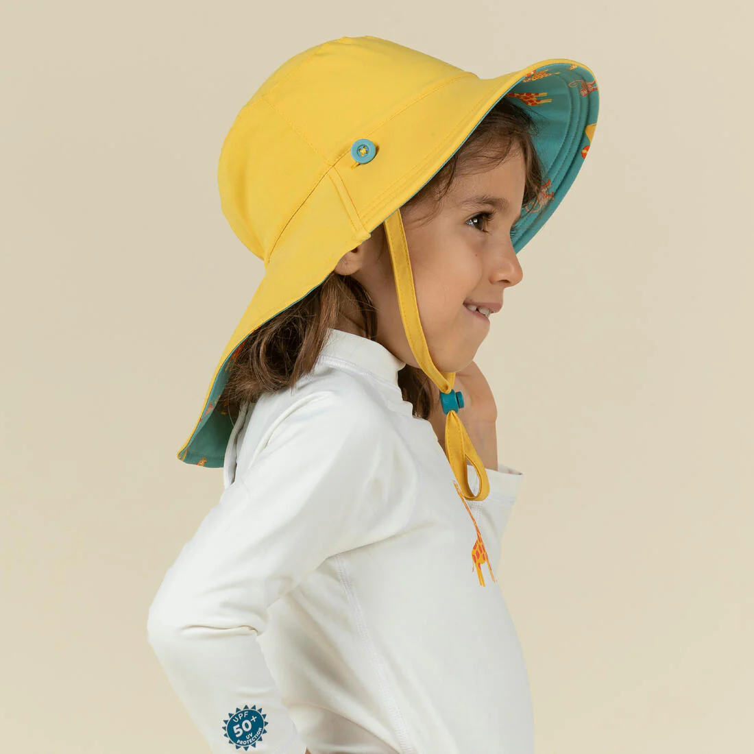 Sombrero de natación reversible anti-UV azul con estampado de sabana para bebé - Image 7